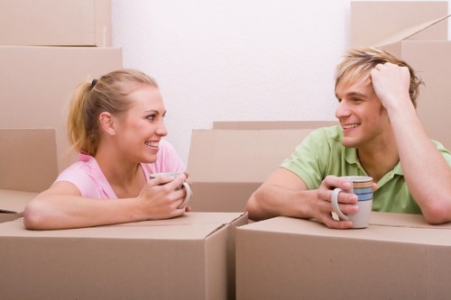 Flat removals team preparing belongings in a Holland Park apartment