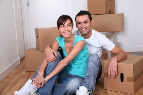 Professional movers loading belongings for a Hollandpark home move