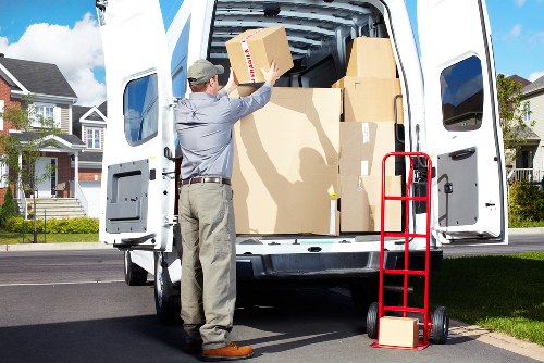 Boxes and furniture being packed into a mobile self storage unit