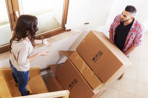 Furniture and household items being moved from a Hollandpark flat