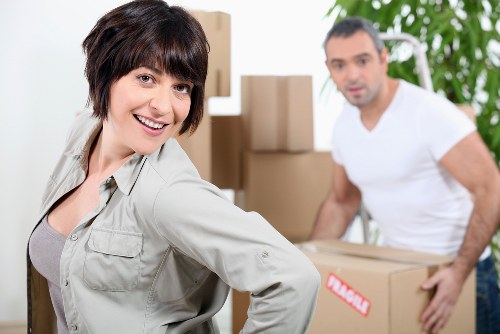 User checking a locked storage unit before leaving the premises